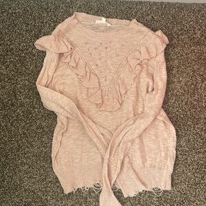 Distressed ruffle top